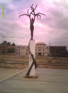 Freedom monument in Skopje, Macedonia. Defaced with graffitti of a Dollar $ sign, it shows to me how the country is now a slave to capitalism, as bad a tyrant as communism.