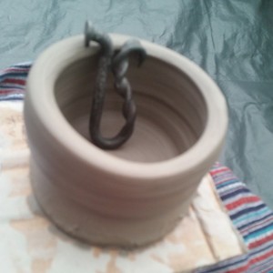A nail and a pot - our Carty is more a blacksmith than a potter