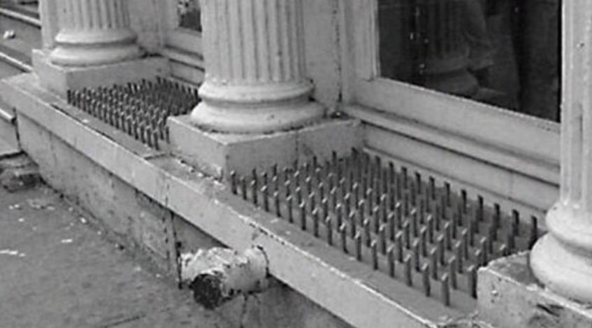 Anti Homeless Spikes in an American Window - many homess are war veterans from the US Army