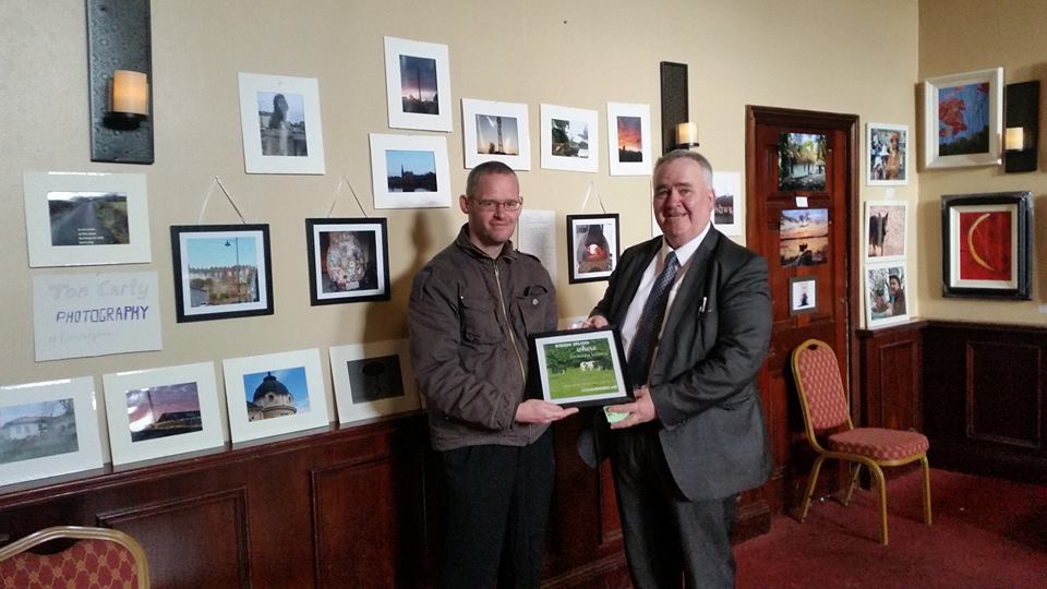Presenting Willie Penrose with a framed URBAN HORSES meme at Edgeworthstown PIETA House exhibition